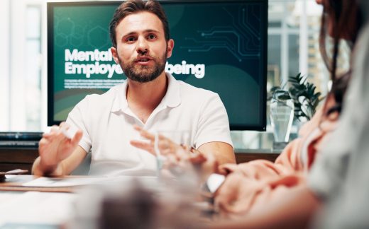 Collaboration, meeting and mental wellbeing with business people in boardroom of office for workshop. Human resources, presentation and psychology with employee team in workplace for staff wellness